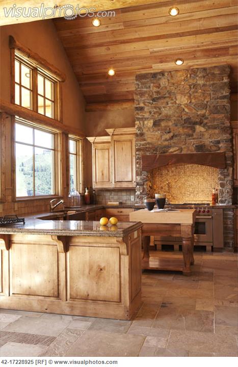 Kitchen with Stone Range Hood