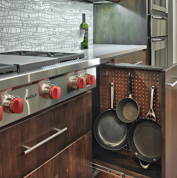 07pegboardsinsertedintoaverticaldrawertostorefryingpans