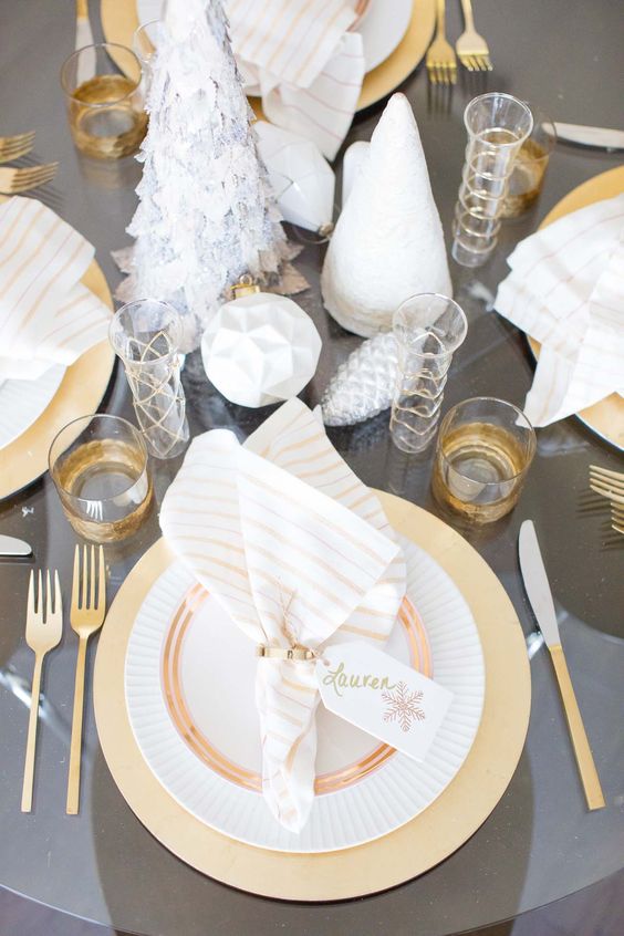 23 A Grey And Gold Table Setting With Cone Christmas Trees
