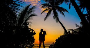 Silhouette of Man and Woman Kissing